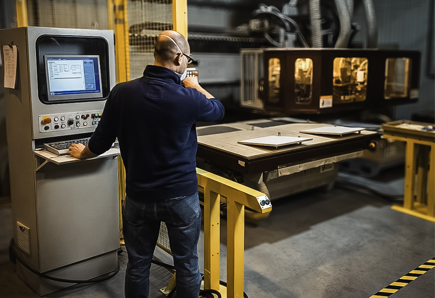 A craftsperson at work, machining timber to precise tolerances.