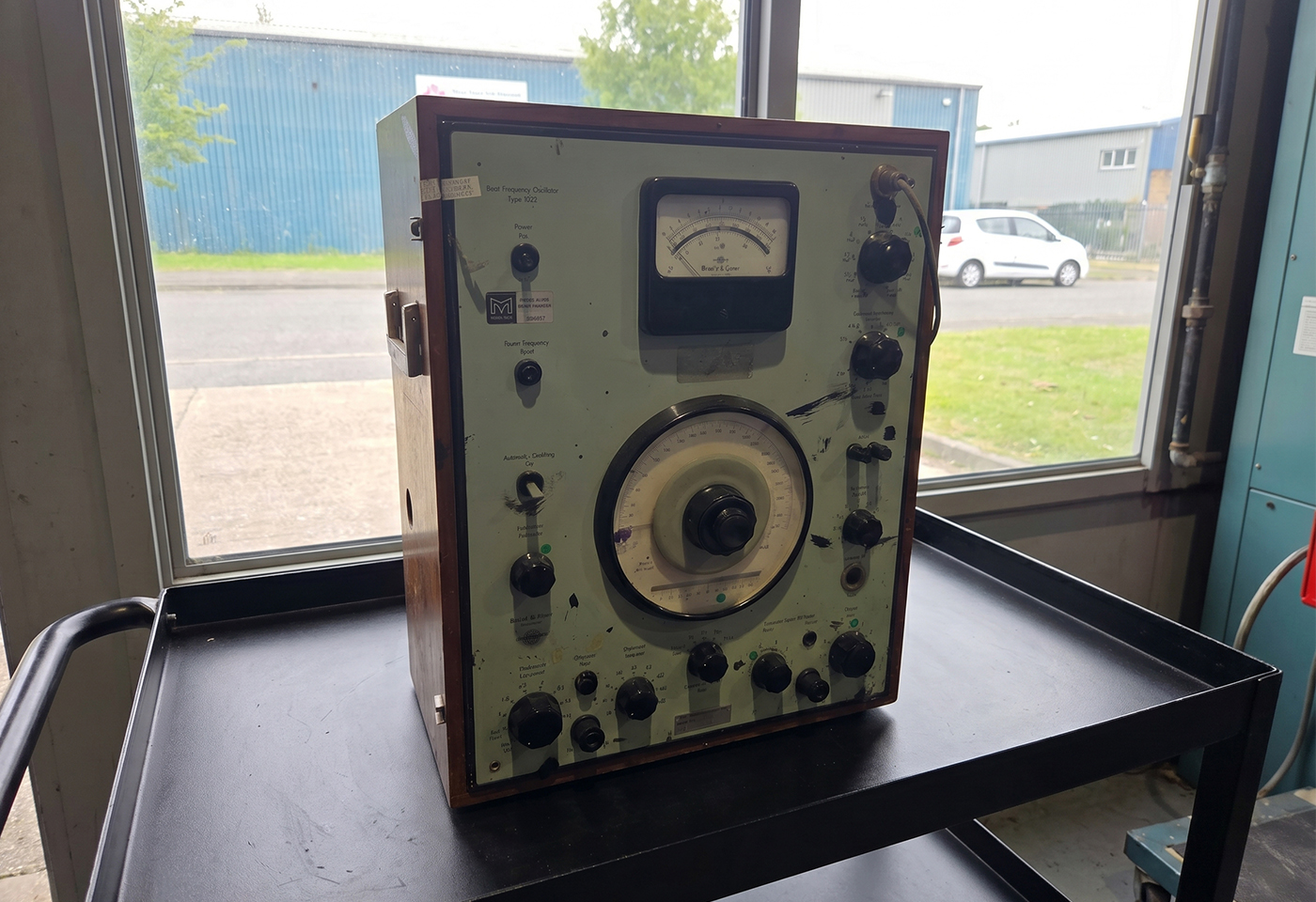 Finished speaker cabinets undergoing final inspection before dispatch at the Sarivale workshop in Calne.